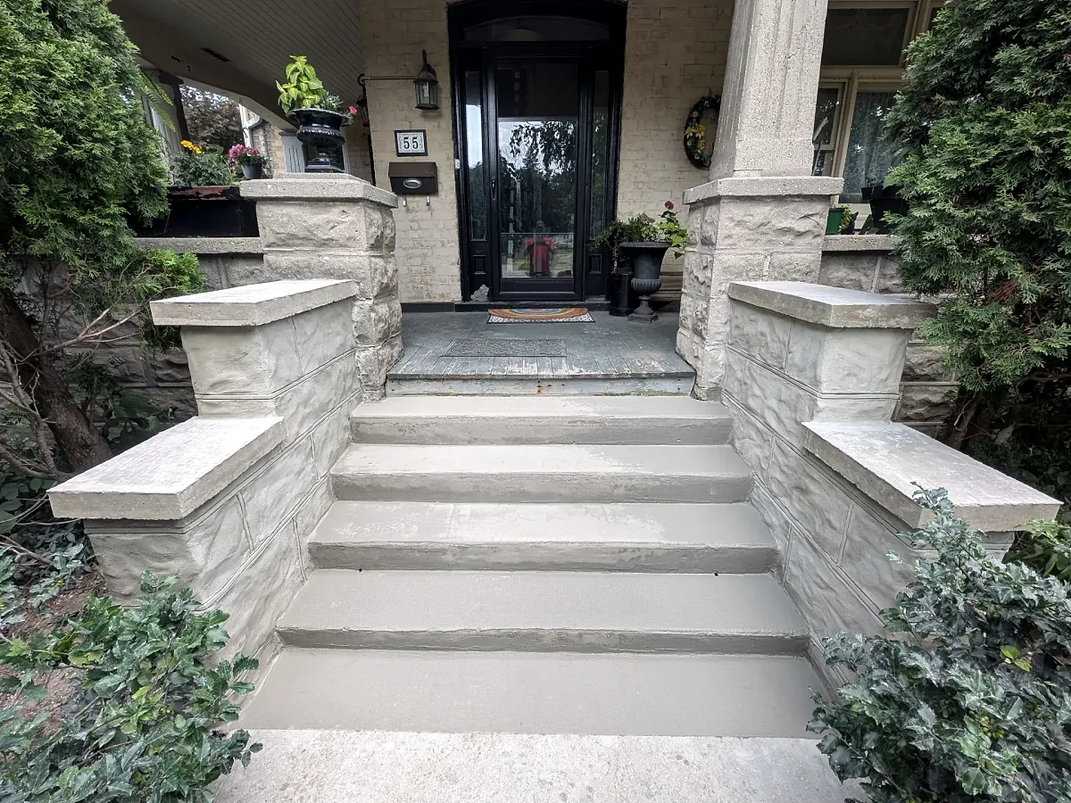 Rebuilt front steps and landing in precast concrete