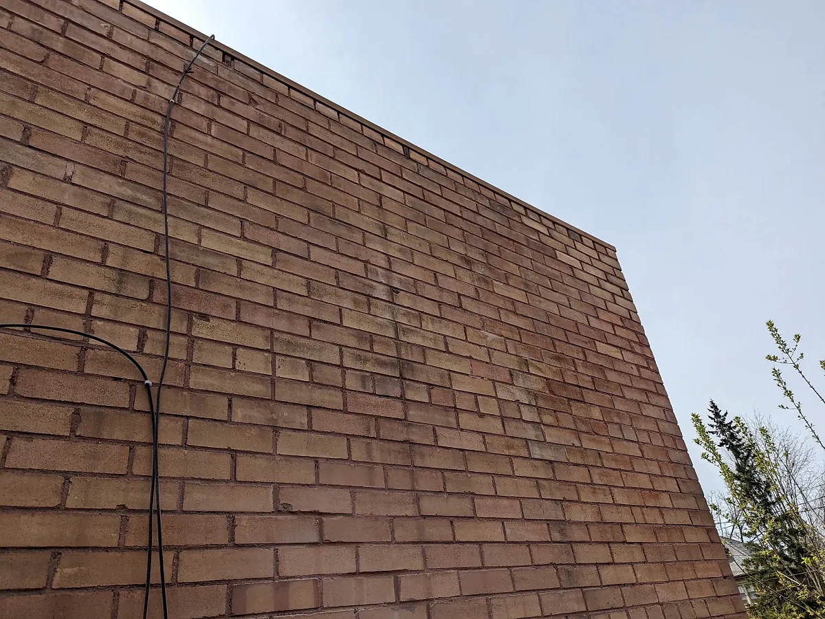 Brown brick gable wall built by Parker Masonry