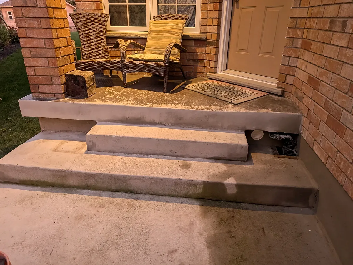 Precast concrete front steps at a doorway